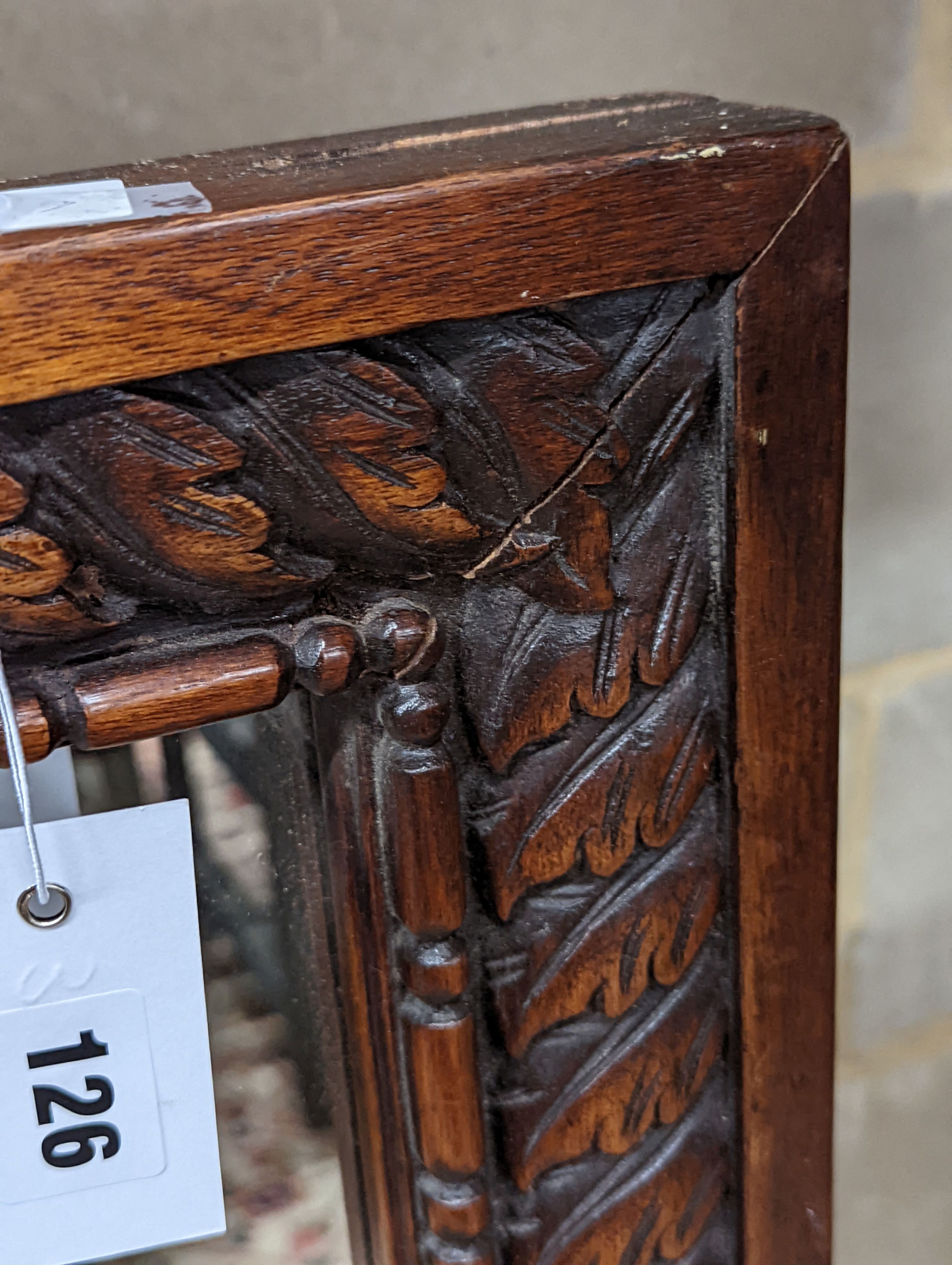 A carved mahogany rectangular wall mirror, width 82cm, height 110cm